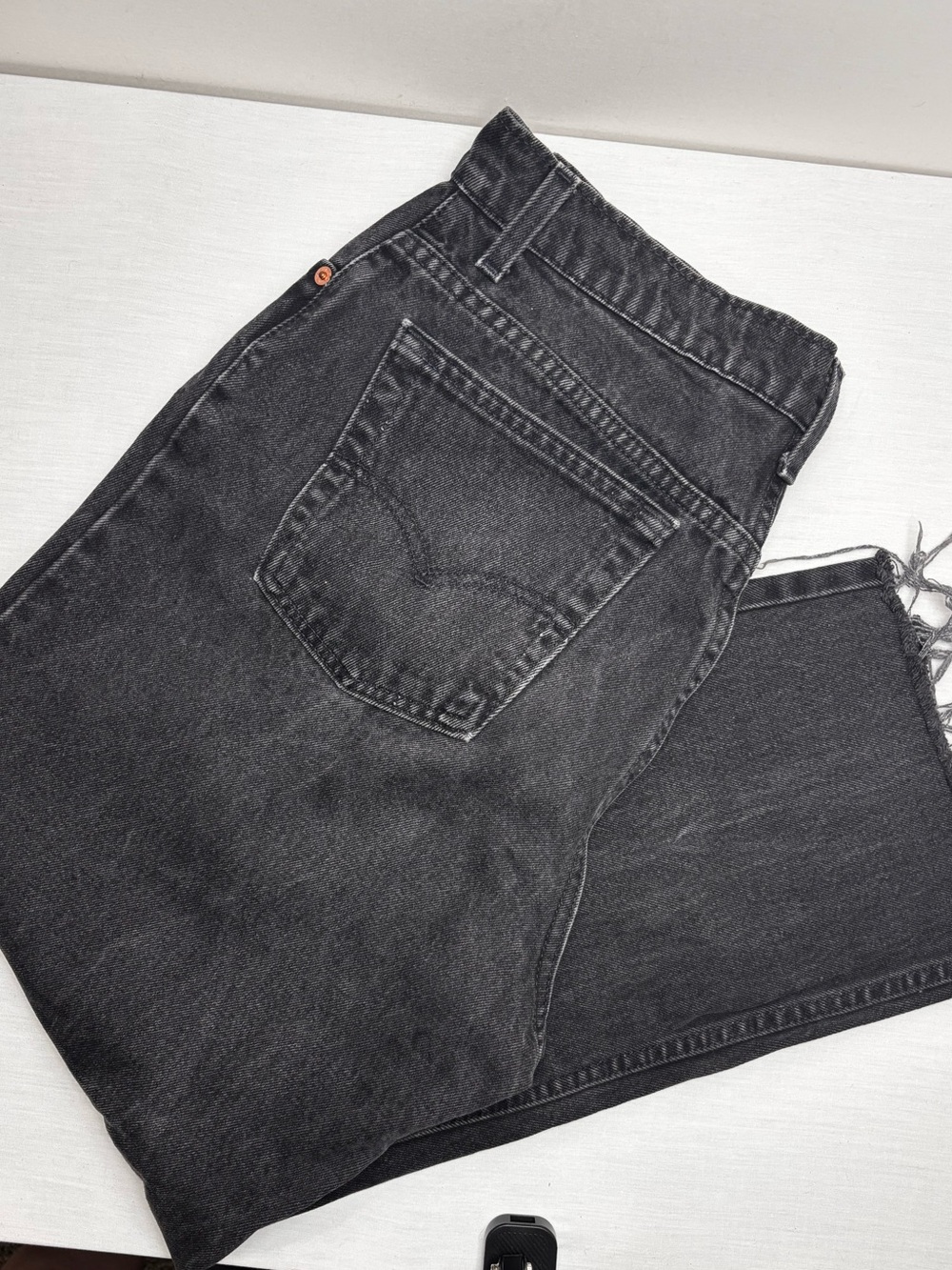 Levi’s Black Frayed Hem Jeans